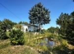 titelbild - Charmanter Bungalow auf großzügigem Grundstück mit Seeblick
